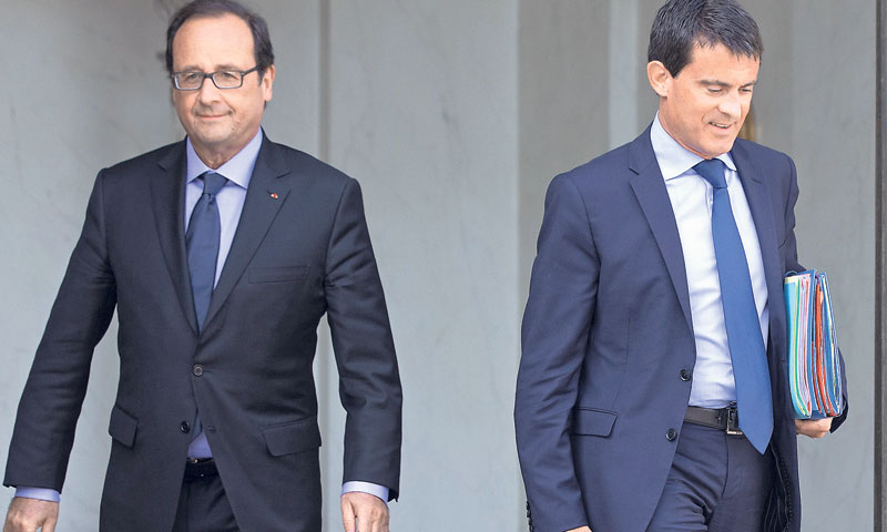 Francuski predsjednik Francois Hollande i dosadašnji ministar gospodarstva Arnaud Montebourg /Reuter