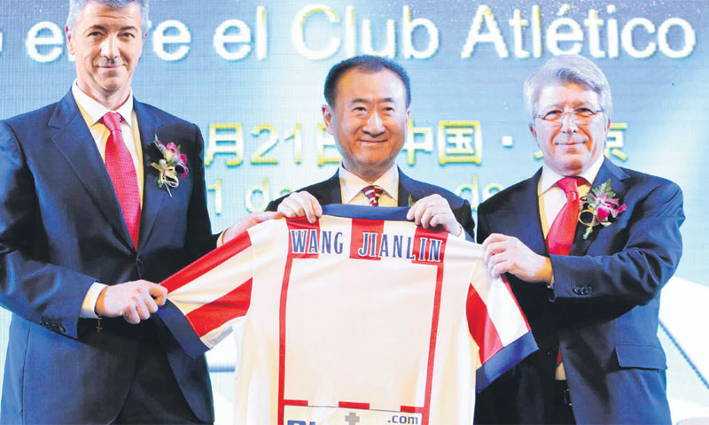 Vlasnik Dalian Wande, Wang Jianlin (u sredini), kupio je petinu udjela u Atletico Madridu/REUTERS