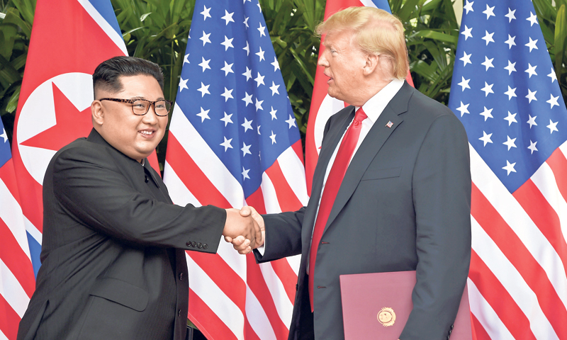 Sjevernokorejski lider Kim Jong Un i američki predsjednik Donald Trump/REUTERS