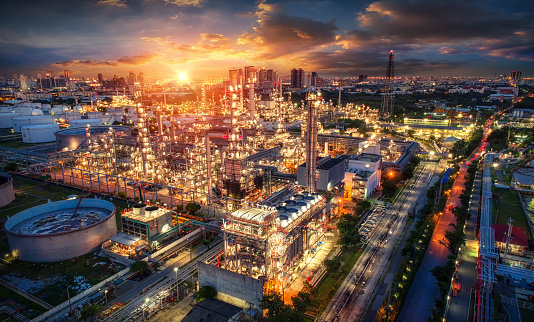 Oil and gas industry - refinery factory - petrochemical plant at sunset