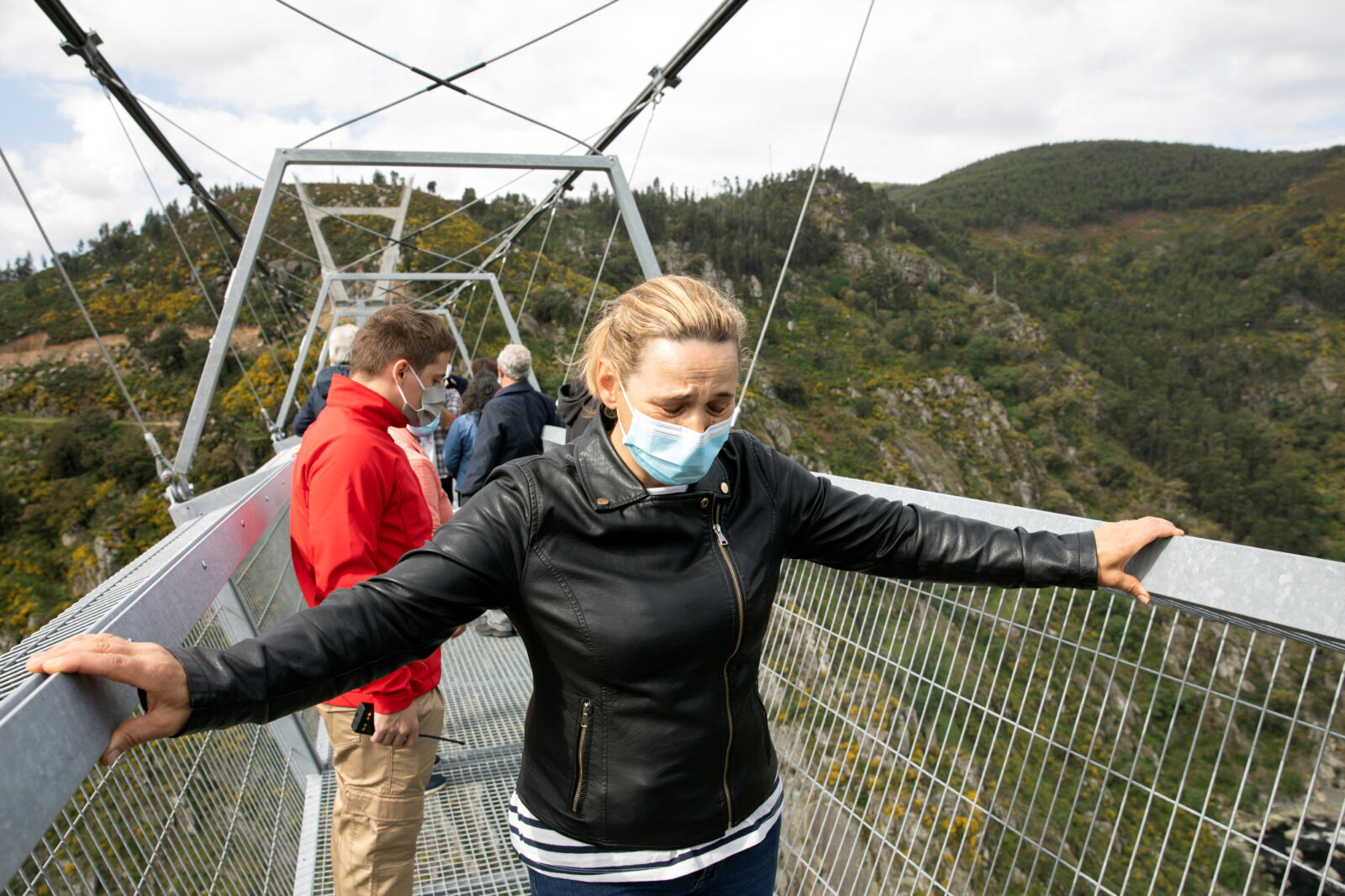 People walk on the world’s longest pedestrian suspension bridge ‘516 Arouca’, in Arouca