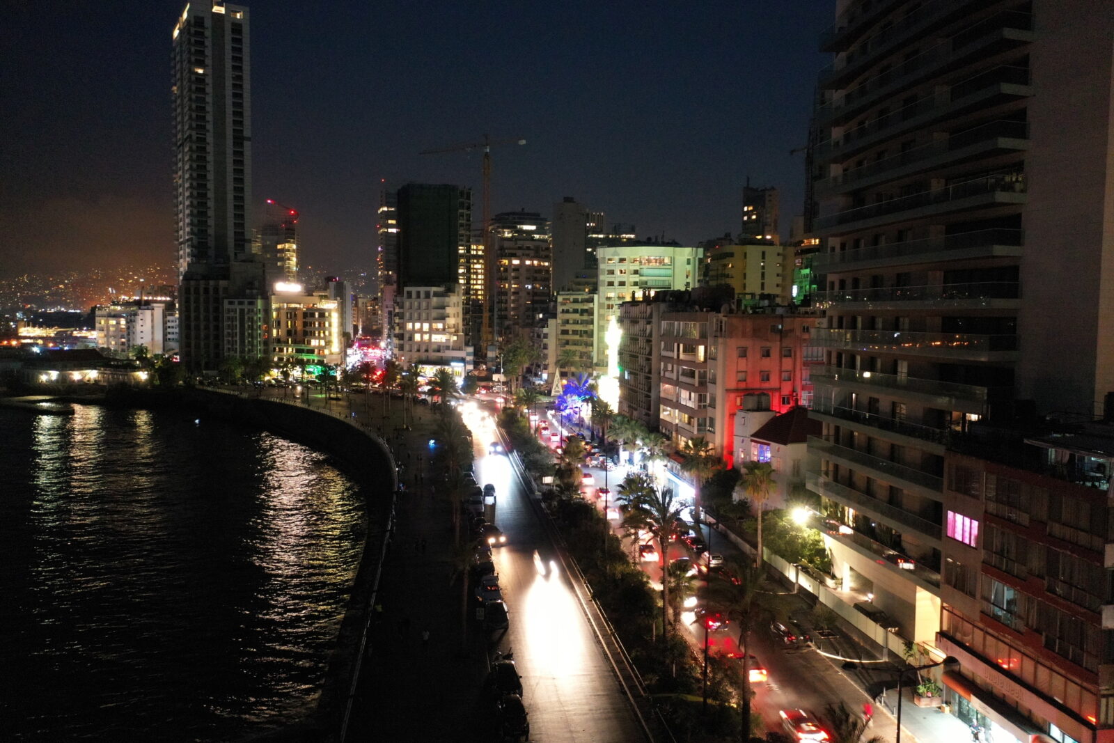A view shows Beirut’s seaside promenade Corniche in darkness during a partial blackout in Beirut