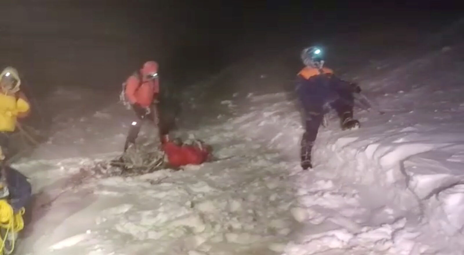 Members of Russia's Emergencies Ministry conduct a rescue operation on the slope of Mount Elbrus