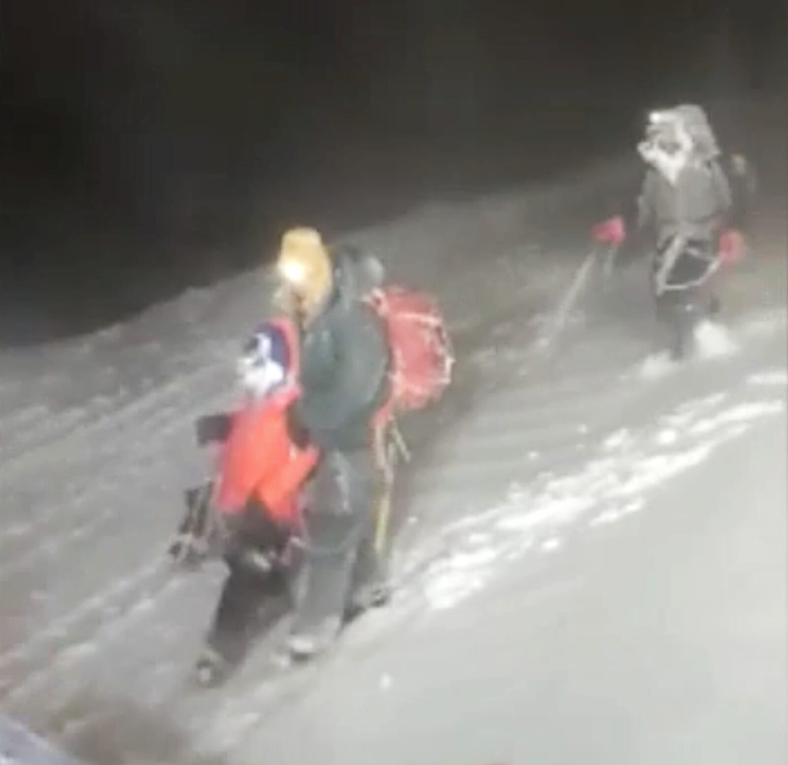 Members of Russia's Emergencies Ministry conduct a rescue operation on the slope of Mount Elbrus
