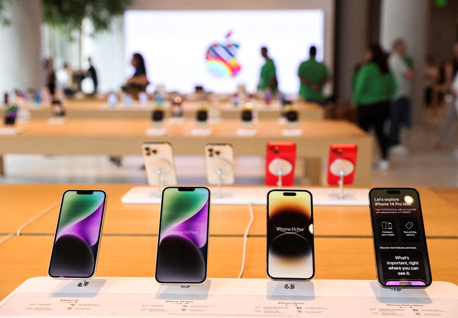 FILE PHOTO: Apple iPhones are seen inside India’s first Apple retail store, a day ahead of its launch, in Mumbai