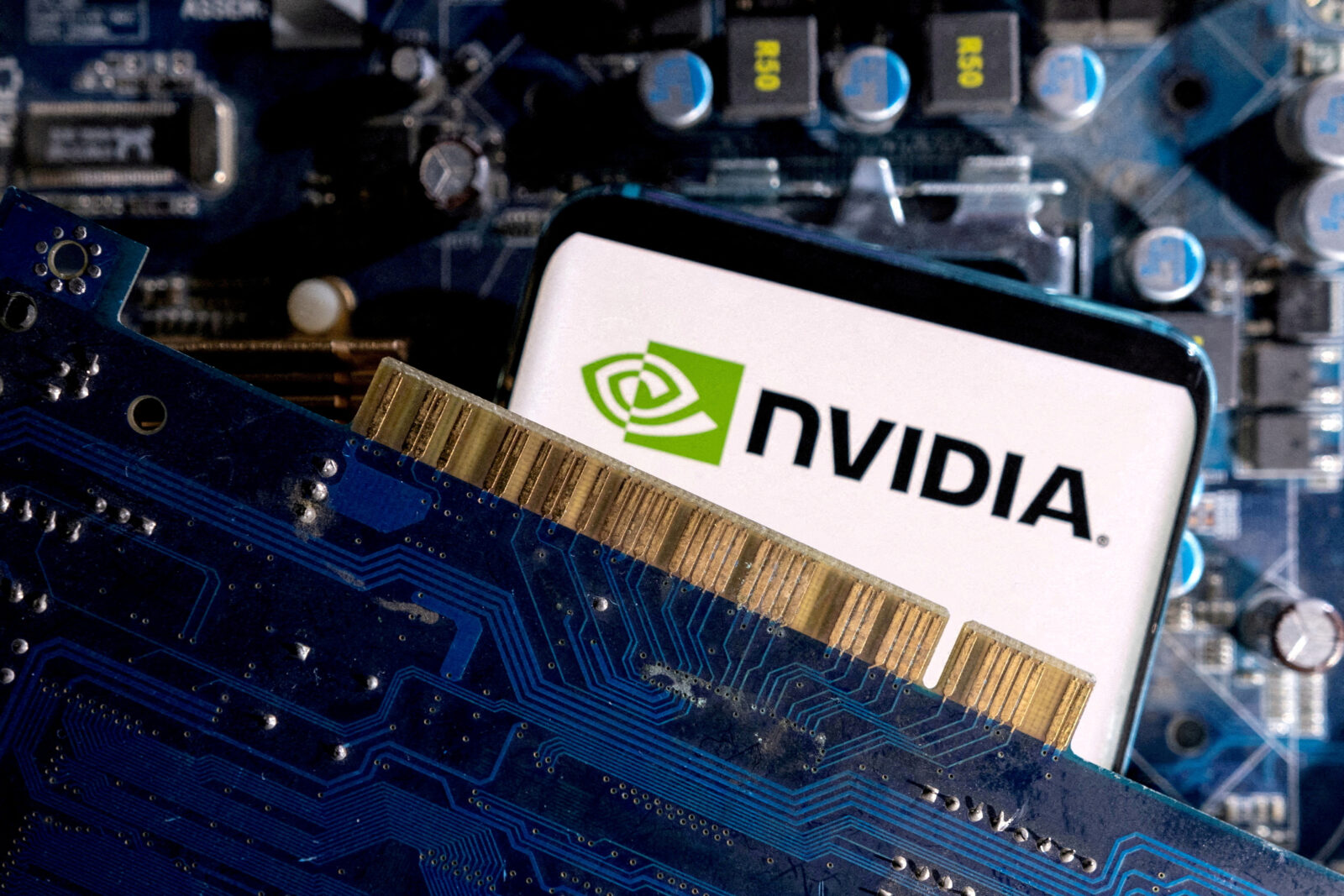 FILE PHOTO: Illustration shows Nvidia logo on a computer motherboard