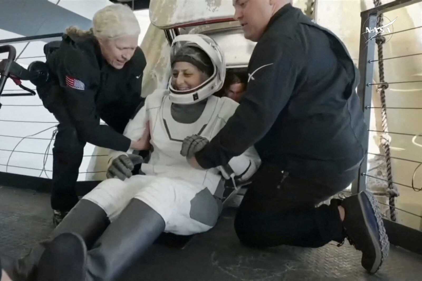 Astronauts Butch Wilmore and Suni Williams return to earth in a Crew Dragon capsule