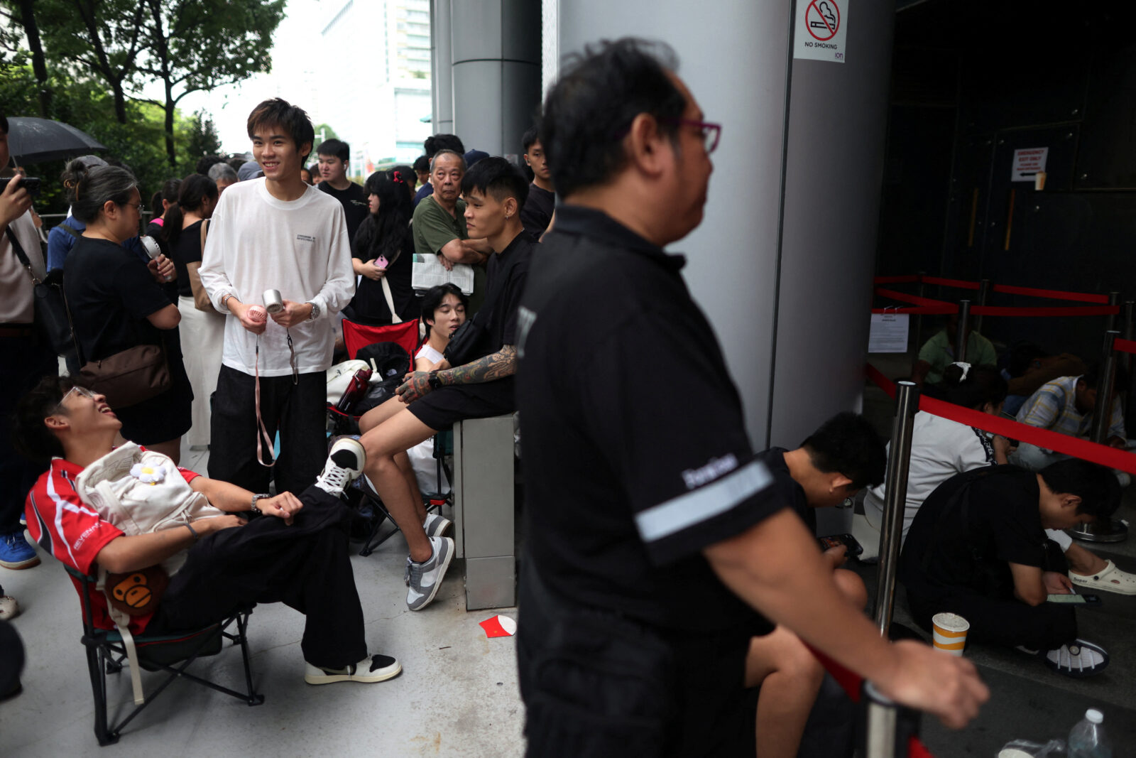 People queue to buy Audemars Piguet & Swatch “Royal Pop” watches in Singapore
